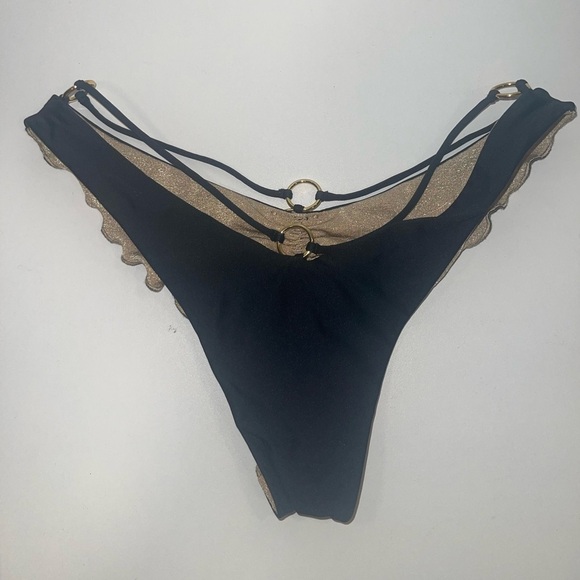 Luli Fama Strappy Loop Brazilian Bikini Bottom
Black Gold Ring Bikini Bottom Sm - Picture 5 of 7